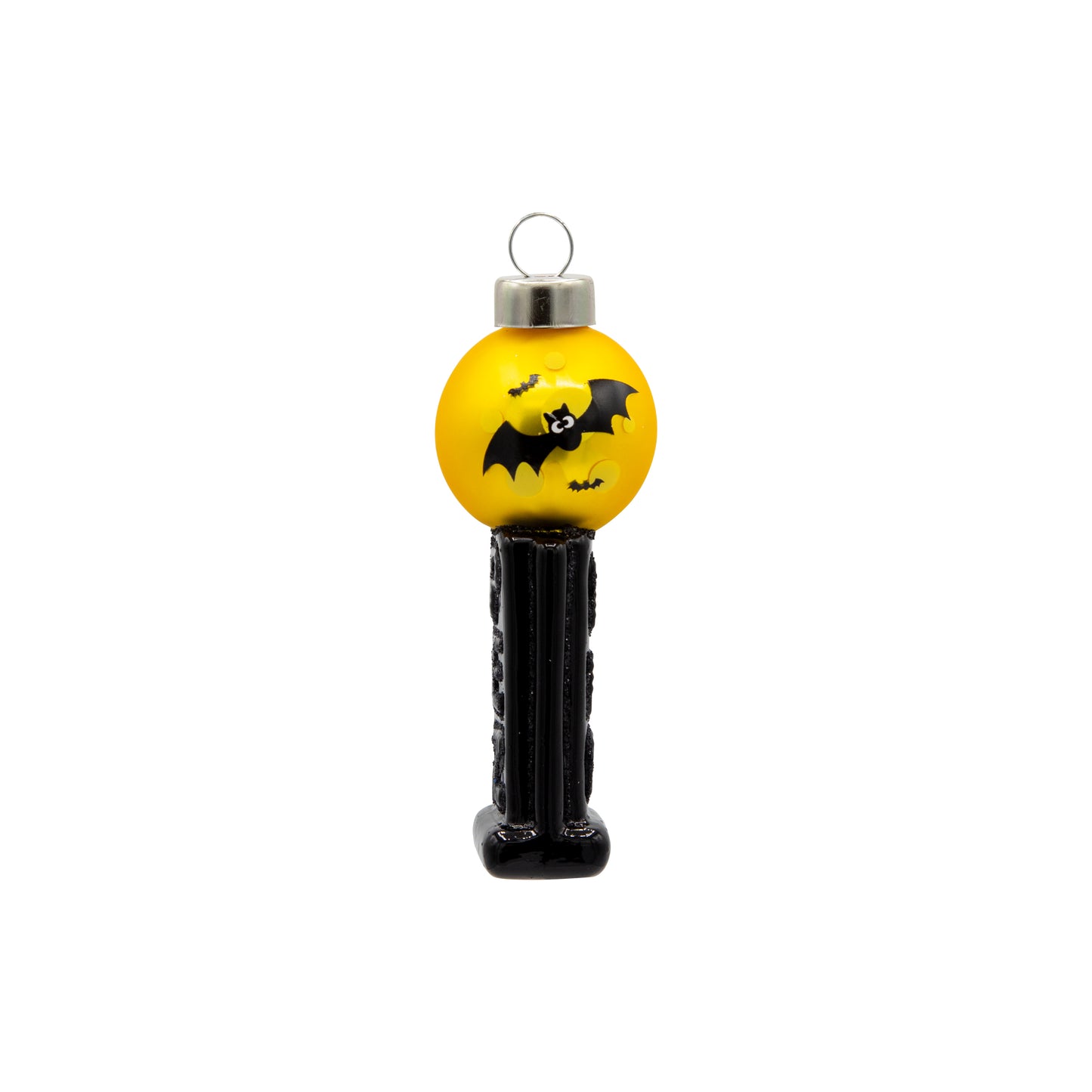 Bat Mini PEZ© Dispenser ornament. A black PEZ dispenser with bats flying in front of a yellow moon. View of front.