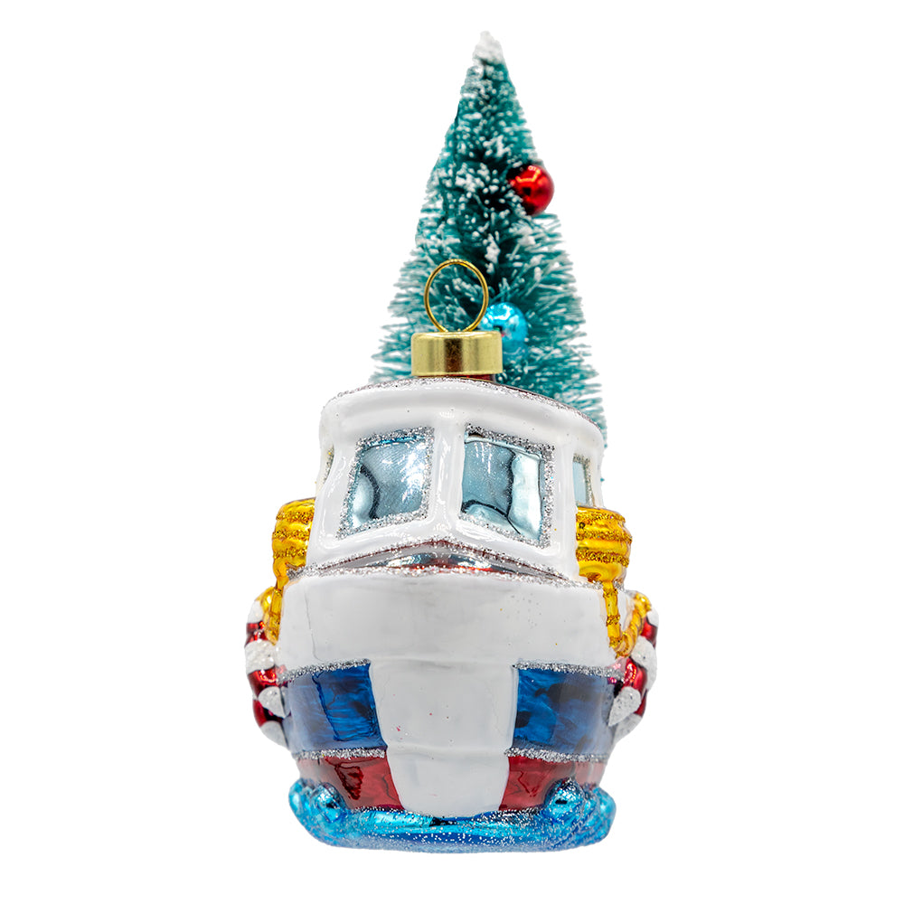 Merry Motorboat ornament. A decorated Christmas tree sits on the back of a sailboat. View of right side.