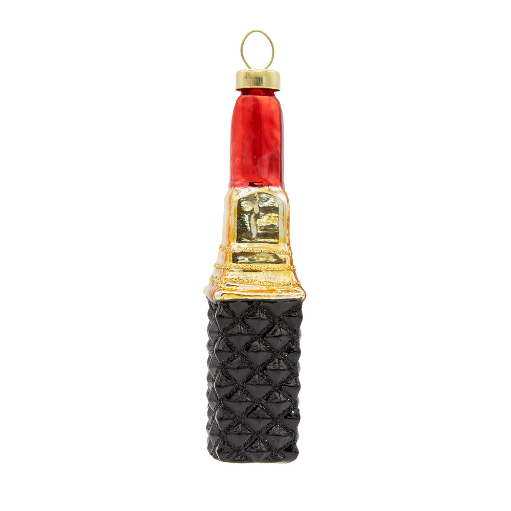 Festive Red Lipstick ornament. A stick of red lipstick with a black geometric patterned base. View of back.