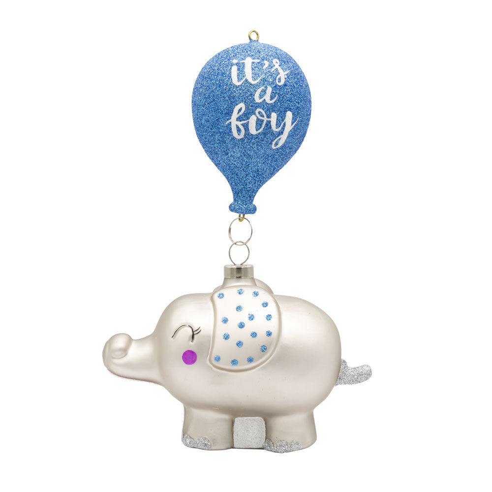 It's A Boy! Elephant ornament. A blue balloon with "it's a boy" written on it floats above an elephant with blue details. View of front.