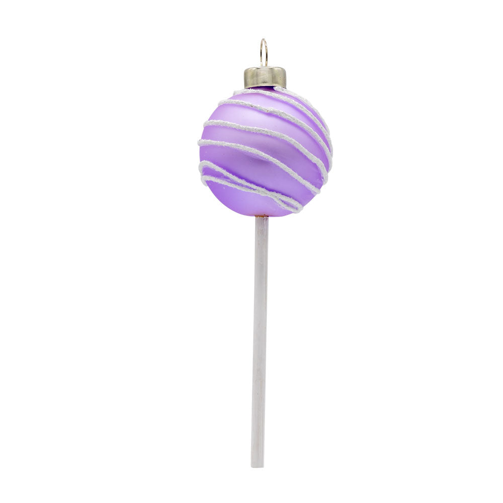 Lavender Swirl Cake Pop. Lavender cake pop with white swirl. View of left side.