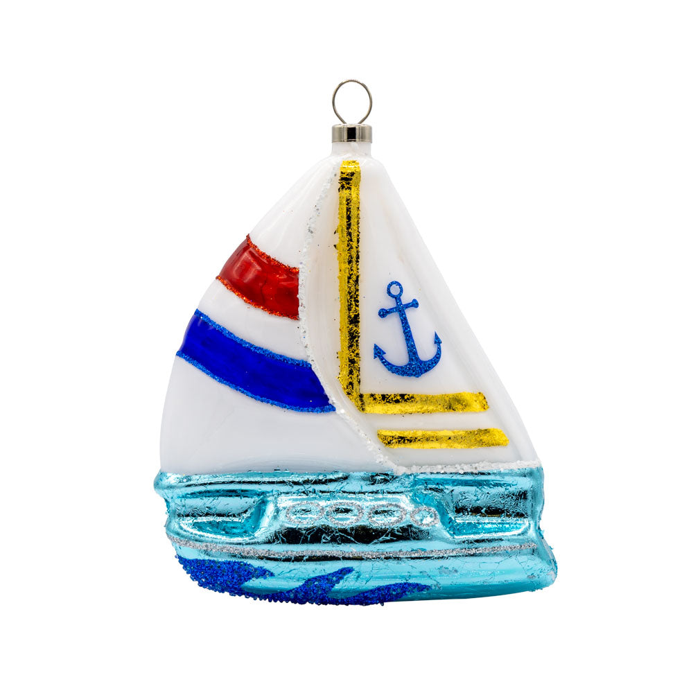 Sail Boat ornament. A sailboat cuts through the waves. View of back.