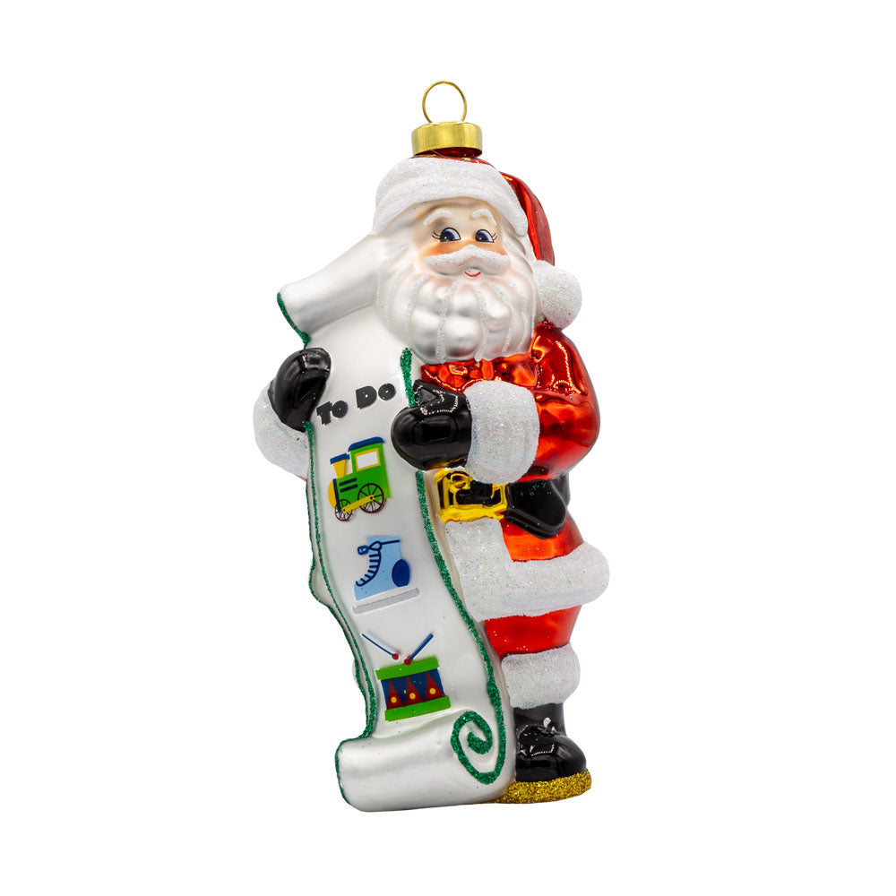 Santa's To Do List ornament. Santa is seen with his to-do list. View of front.
