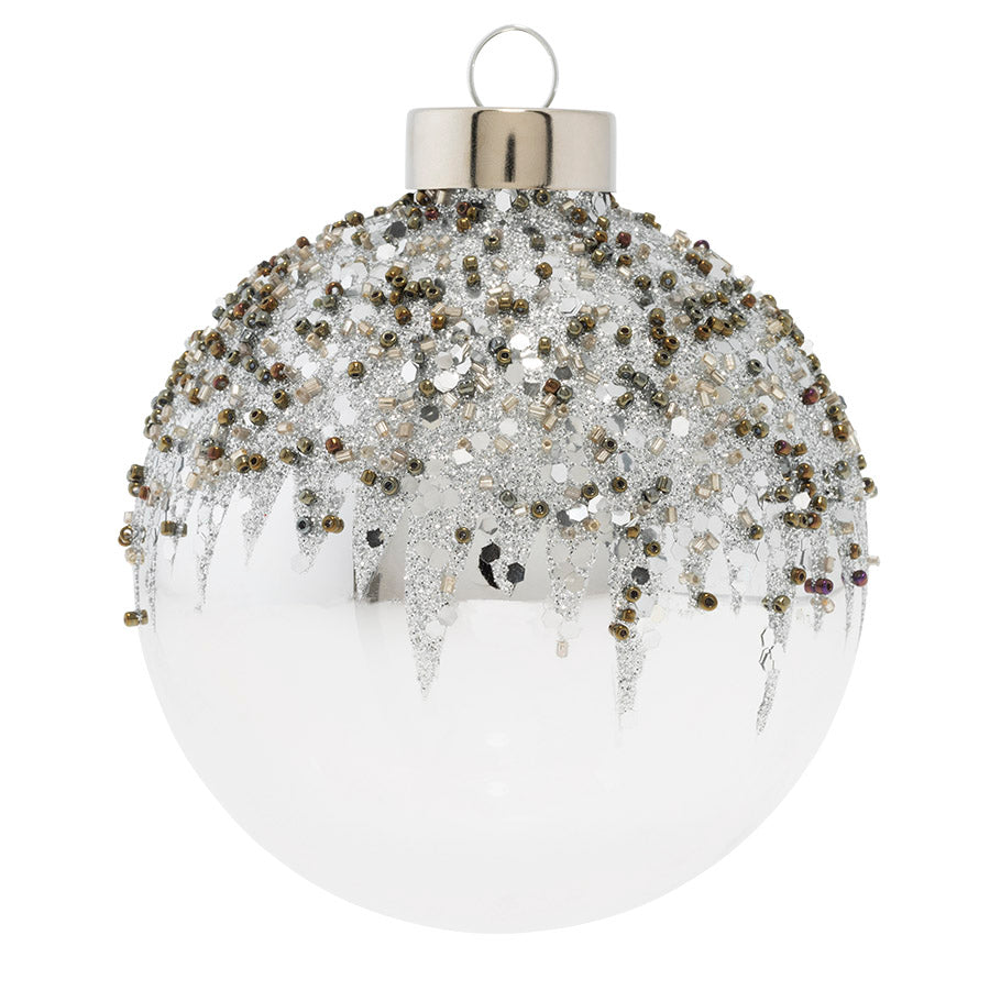 Reflective and shiny, this silver glass round with glitter and bead encrusted snowcap will pop on your Christmas tree.