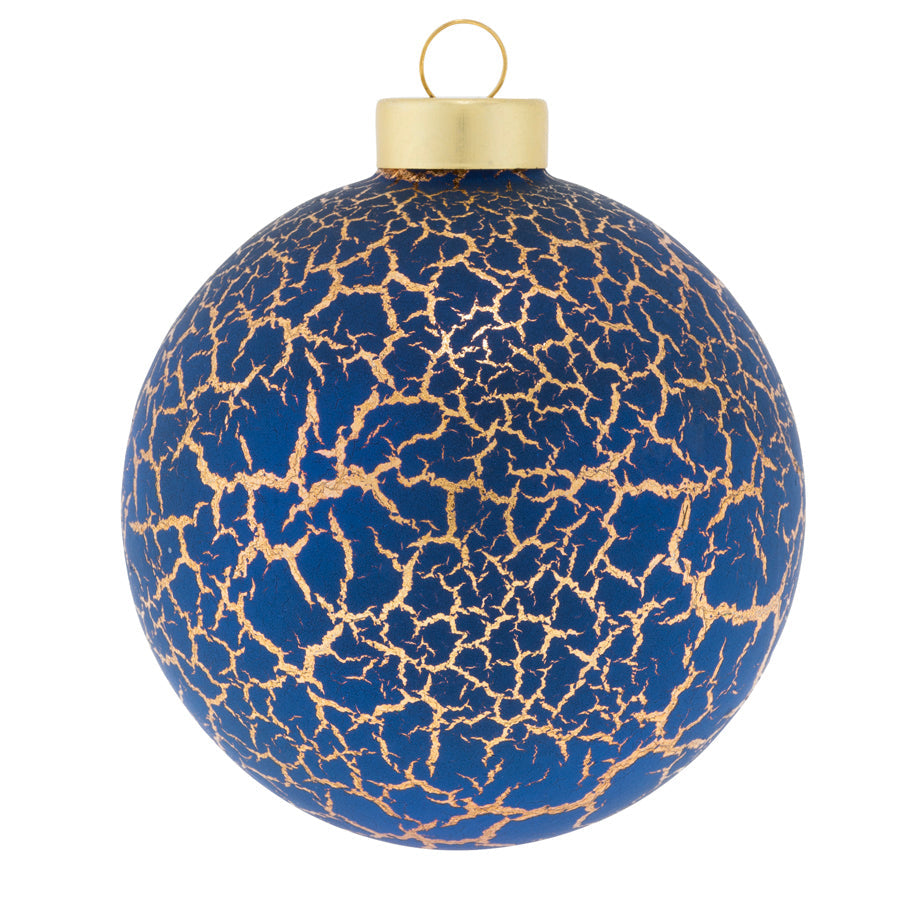 This stunning blue glass ornament covered in a mosaic of cracked gold foil will add a little majesty to any tree.