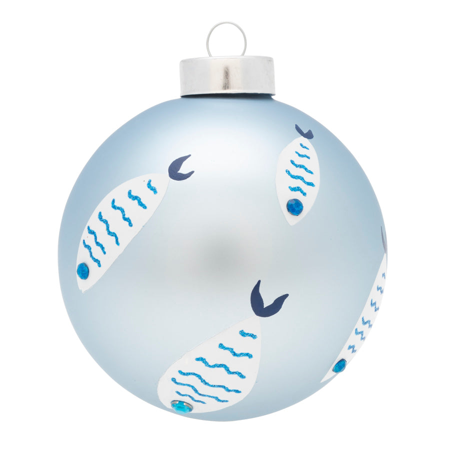 This school of swimming tuna wrap around this coastal blue glass round.