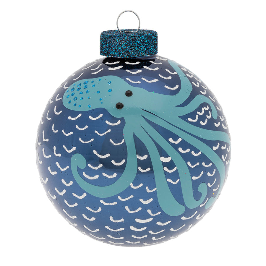 Our painted octopus on a blue glass round adds a lively nautical feel to your Christmas tree.