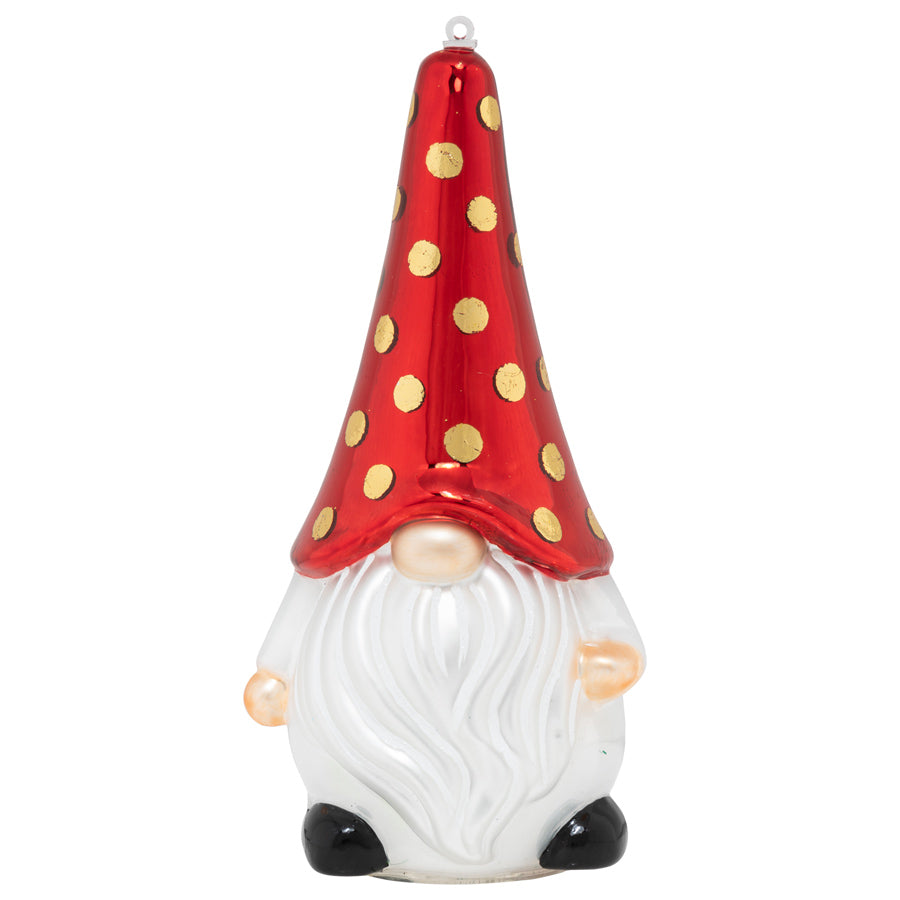 His sweet button nose is the perfect match for the gold polka dots atop this gnome’s shiny red cap.
