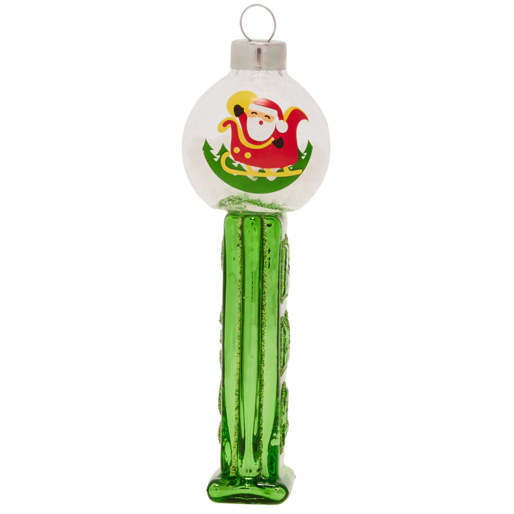 Santa is celebrating from inside a winter wonderland snowglobe atop this adorable PEZ™ dispenser ornament.
