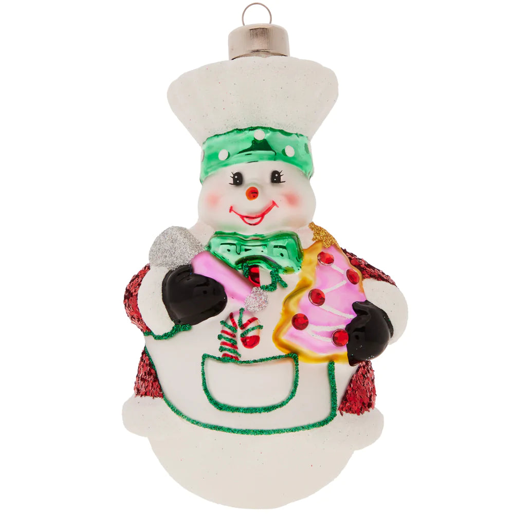 With an adorable chef hat and apron, this jolly snowman is ready to bake some Christmas cookies this holiday season.