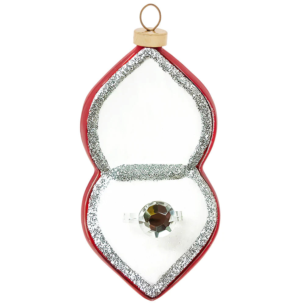 This classic black ring box reveals a gorgeous glittering gem.