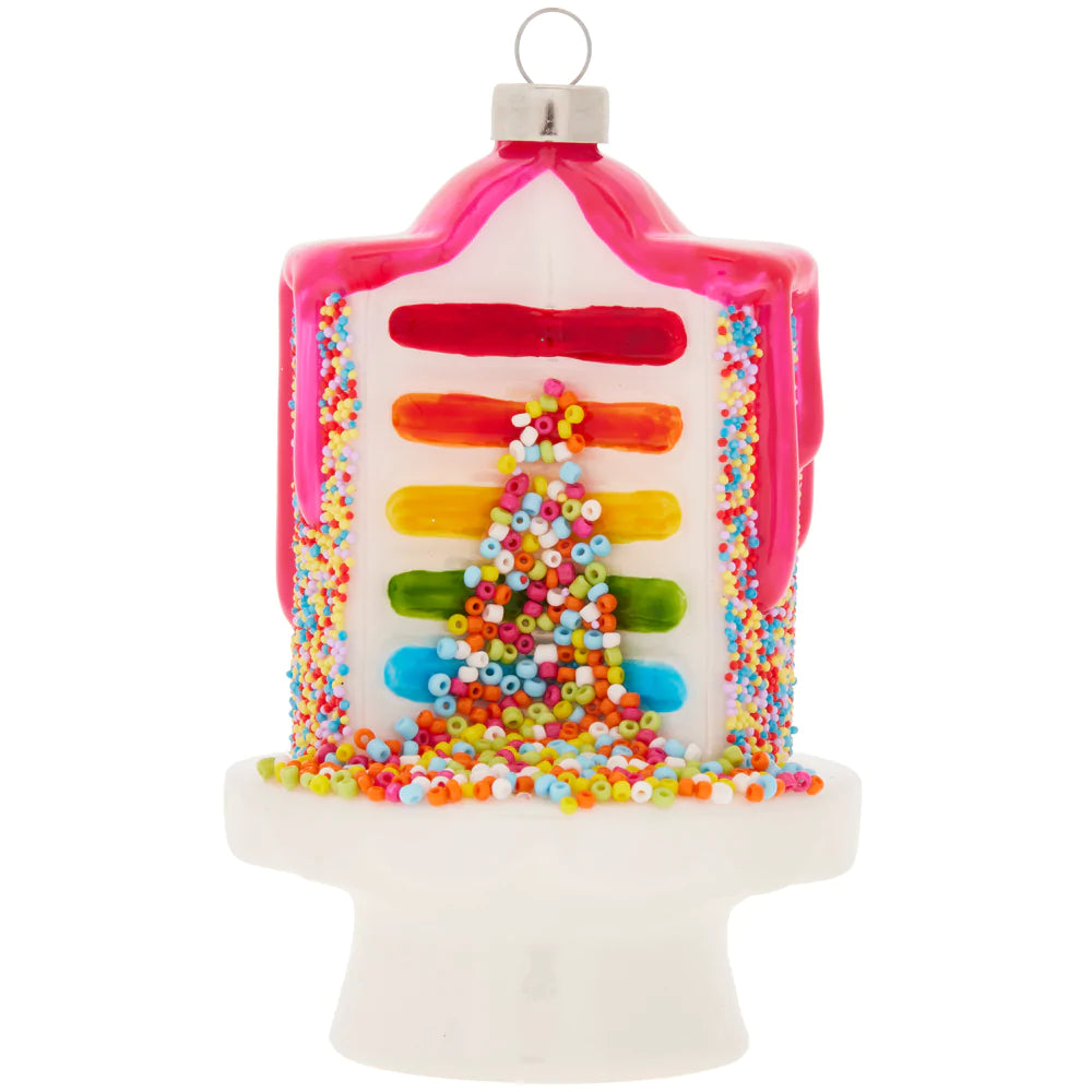 Surprise! This colorful confetti cake opens to reveal a rainbow center filled with sprinkles.
