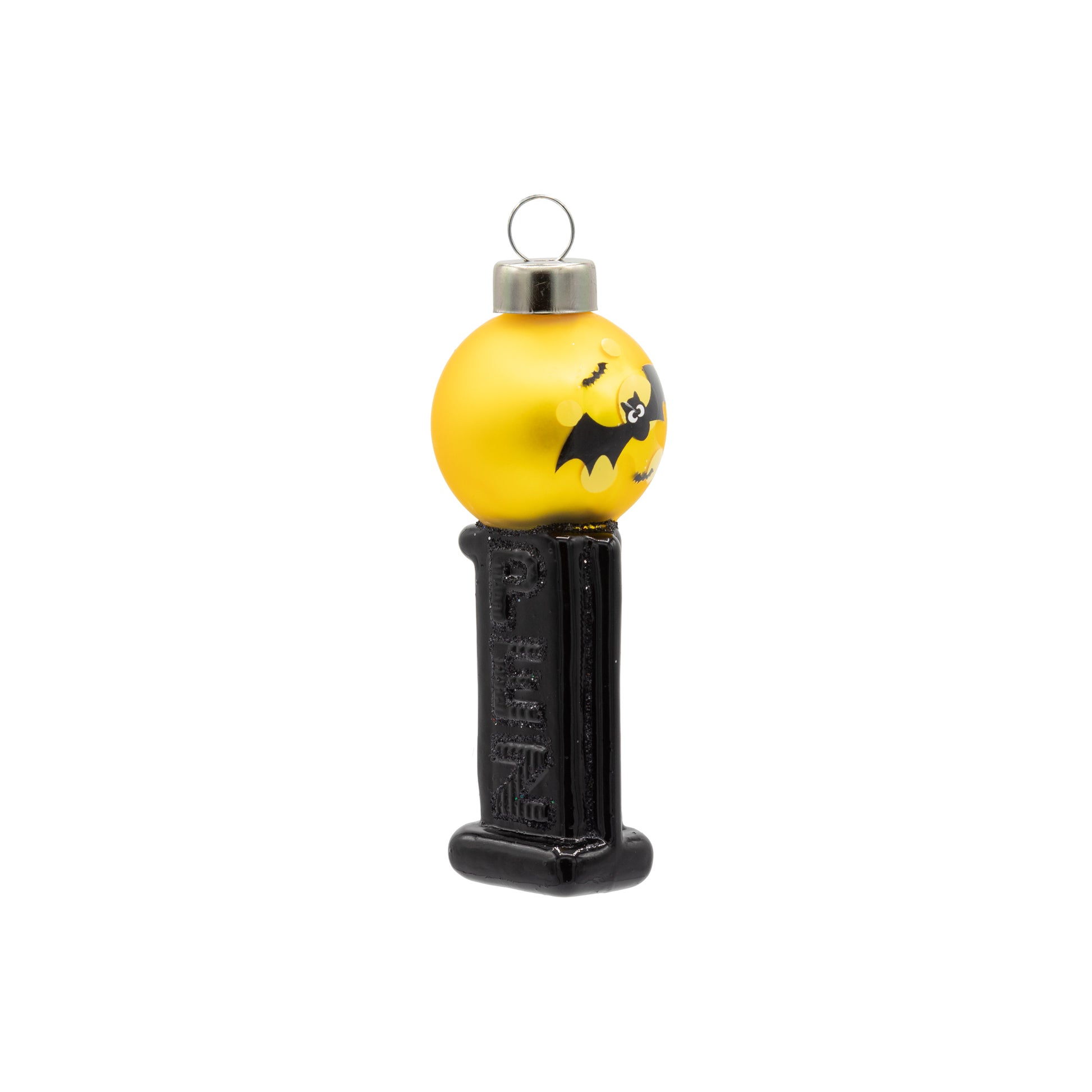 Bat Mini PEZ© Dispenser ornament. A black PEZ dispenser with bats flying in front of a yellow moon. View of left side.