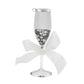 Wedding Champagne Toast ornament.  A champagne flute filled with silver sequins and a white ribbon tied around the stem. View of back.