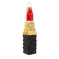 Festive Red Lipstick ornament. A stick of red lipstick with a black geometric patterned base. View of front. 
