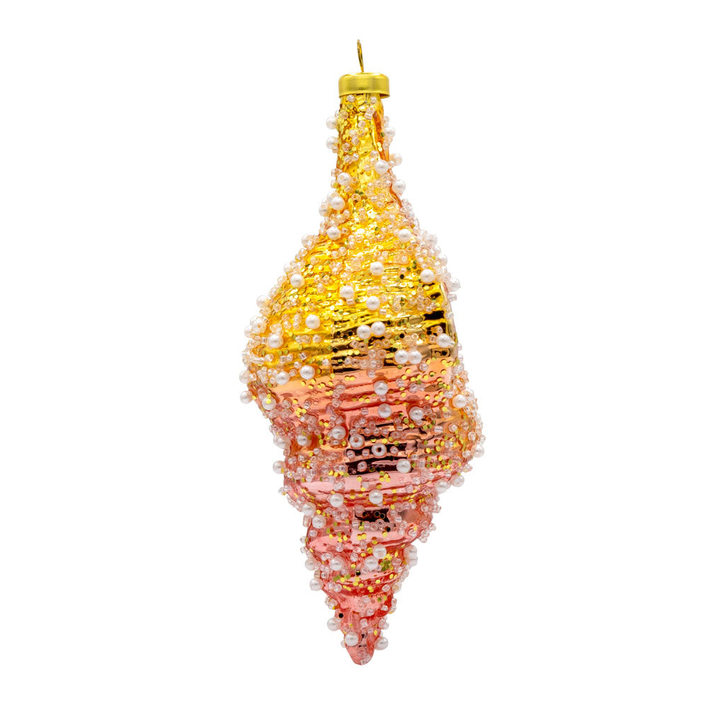 Conch Shell ornament. This yellow and pink shell is adorned with white beads and pearls. View of left side.