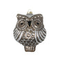 With a dark antiqued mercury finish, this enchanting glass owl is detailed with twinkling, silver glitter paint.