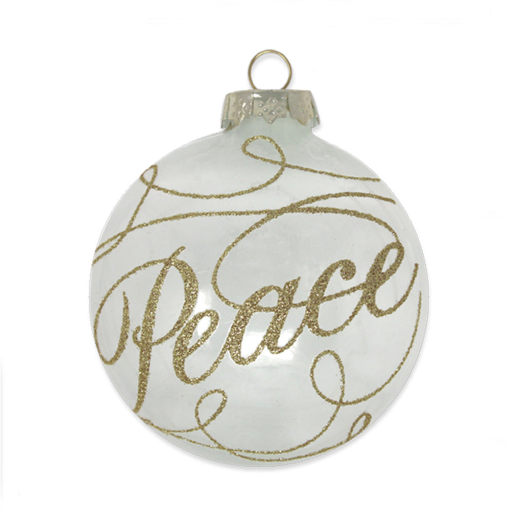 This shiny opal glass disc is elegantly decorated with graceful gold glitter script reading "Peace".