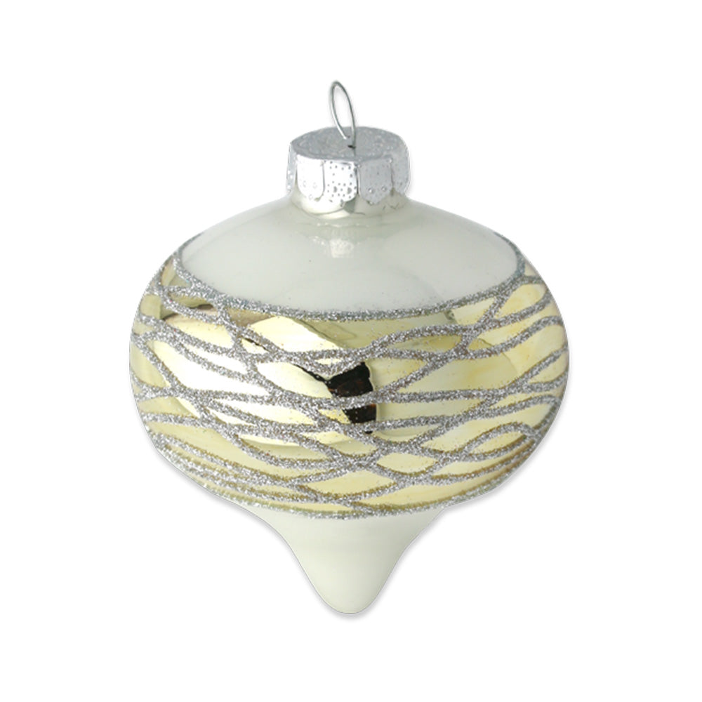 A delicate, white opal glass onion is wrapped in a luminous gold that is accented with an intricate silver glitter pattern. 