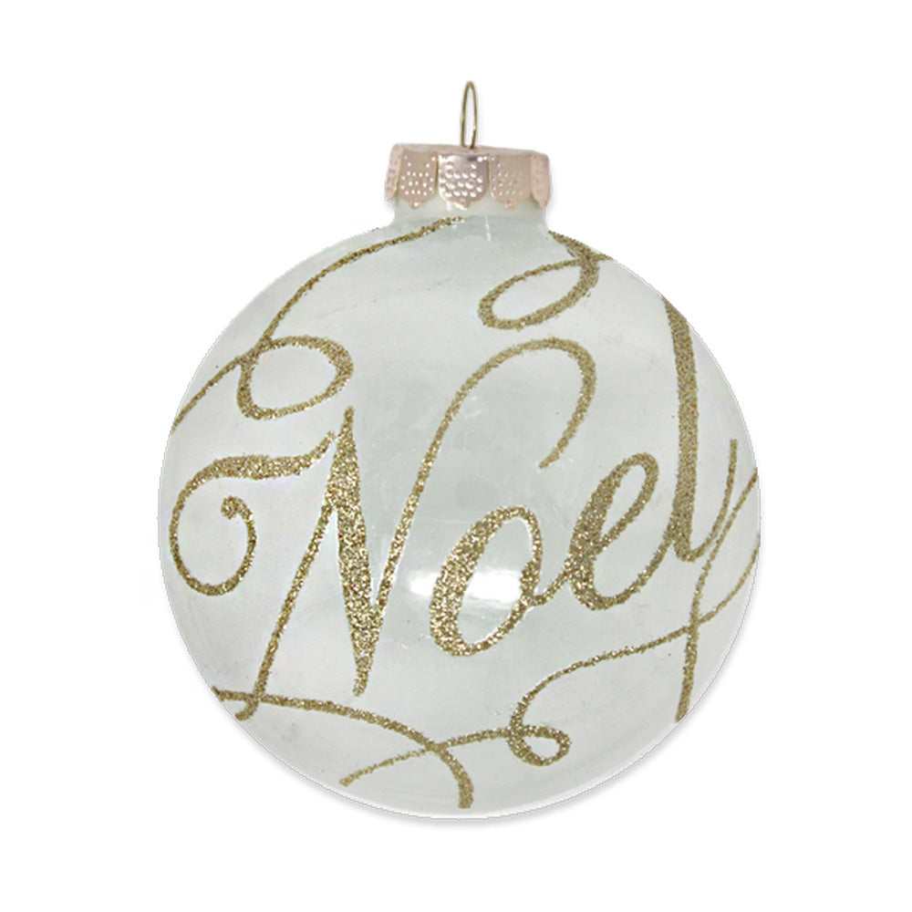 This shiny opal glass disc is elegantly decorated with graceful gold glitter script reading "Noel".