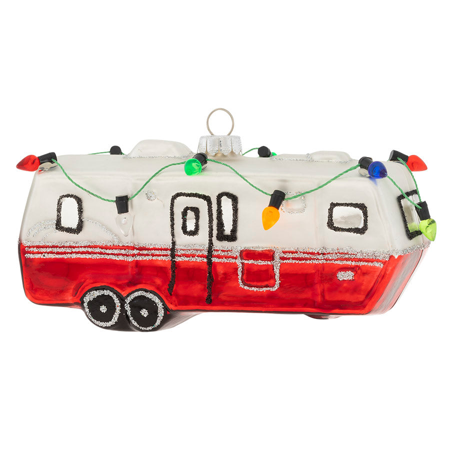 This Retro Camper has the Christmas spirit with its brightly colored lights dancing along the top of this delightful glass ornament. 