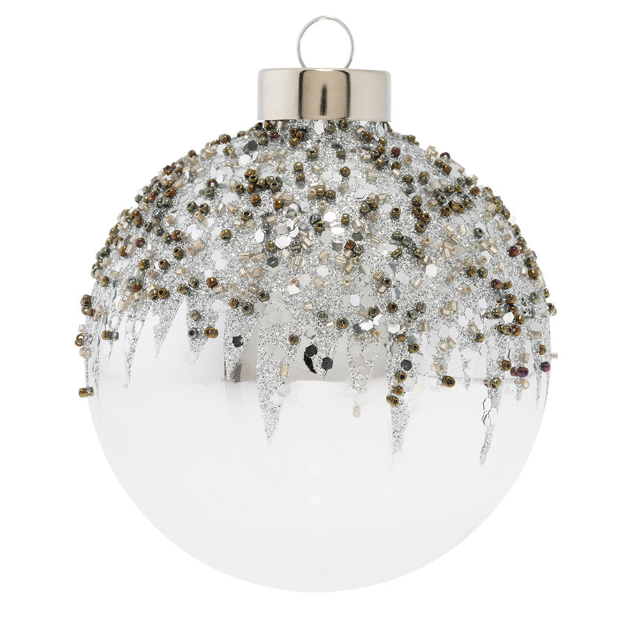 Reflective and shiny, this silver glass round with glitter and bead encrusted snowcap will pop on your Christmas tree. 