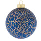 This stunning blue glass ornament covered in a mosaic of cracked gold foil will add a little majesty to any tree. 