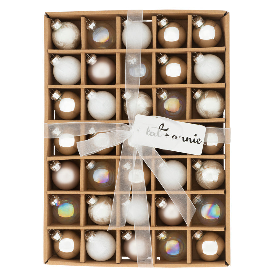 Featuring an array of  baublesthat glisten and shine like the snow, our 35 count glass ornament box set is sure to put any tree, big or small, in the Christmas spirit.