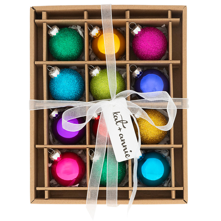 Chic and glittery, this 12 count Rainbow glass ornament box set will add the perfect splash of color to the Christmas season.