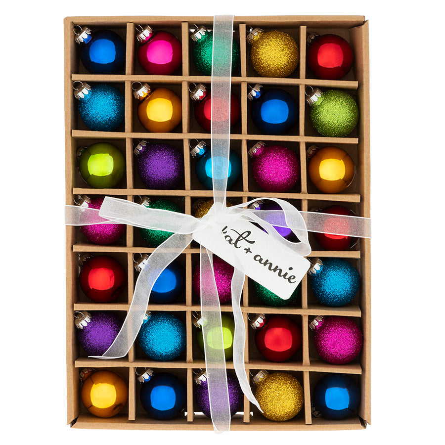 The festive and bright colors creating our 35 count Rainbow glass ornament box set will add a special sparkle to your tree this year.