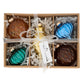 Decorated in the rich colors of the jungle, this box set of 6 glass ornaments will charm any holiday décor!
