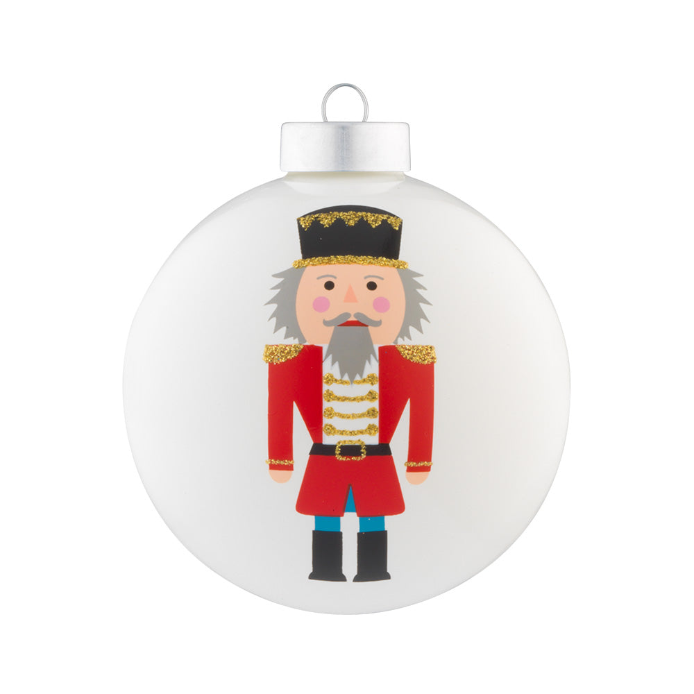 This classic Nutcracker is features on a shiny white round and perfect for the classic holiday decorator.