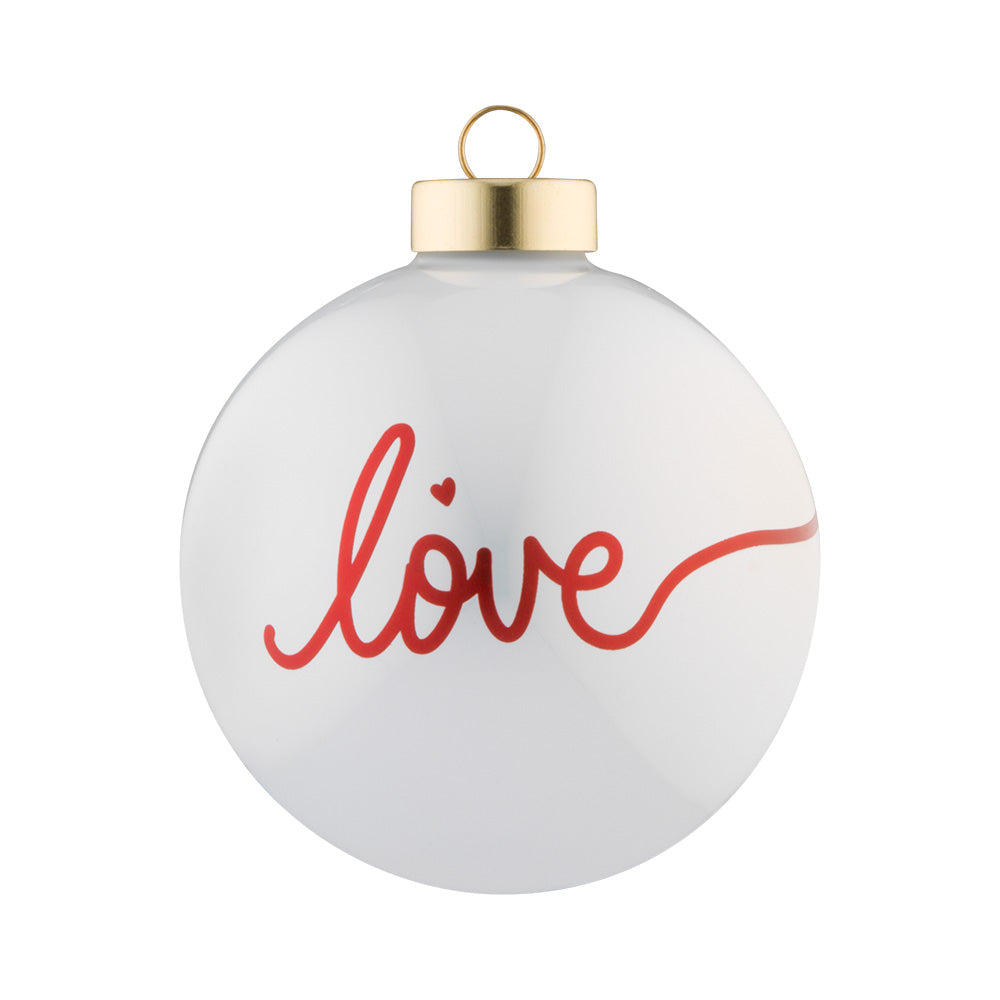 A gentle glass round with a white opal finish is embellished with a delicately scripted red "love".