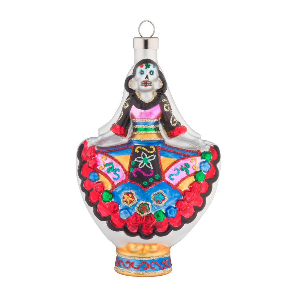 This glass skeleton is holding out her colorful skirt and will be sure to add a spooky touch to your tree this year.