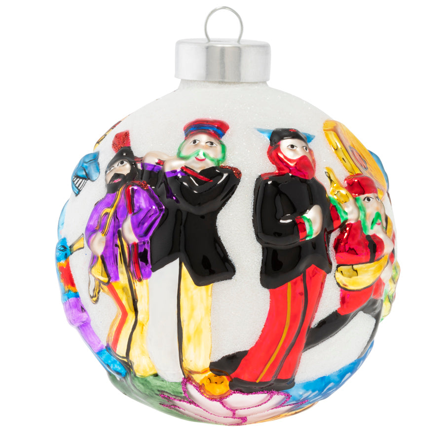 Scenes from Yellow Submarine playful dance around this white glitter round bringing to life all the magic of the beloved film!
