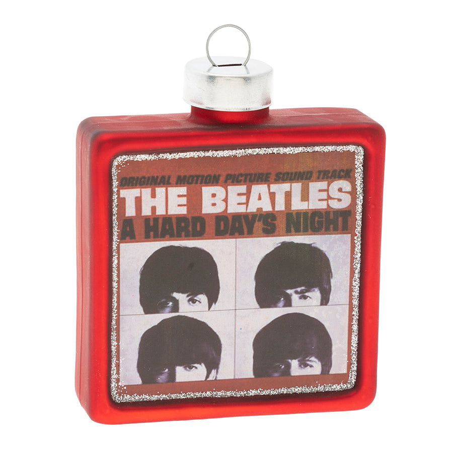 The soundtrack to their critically acclaimed musical comedy film, A Hard Day's Night, this is the fourth album release in the United States from the iconic rock group. This officially licensed glass ornament is the perfect way to commemorate this original album!