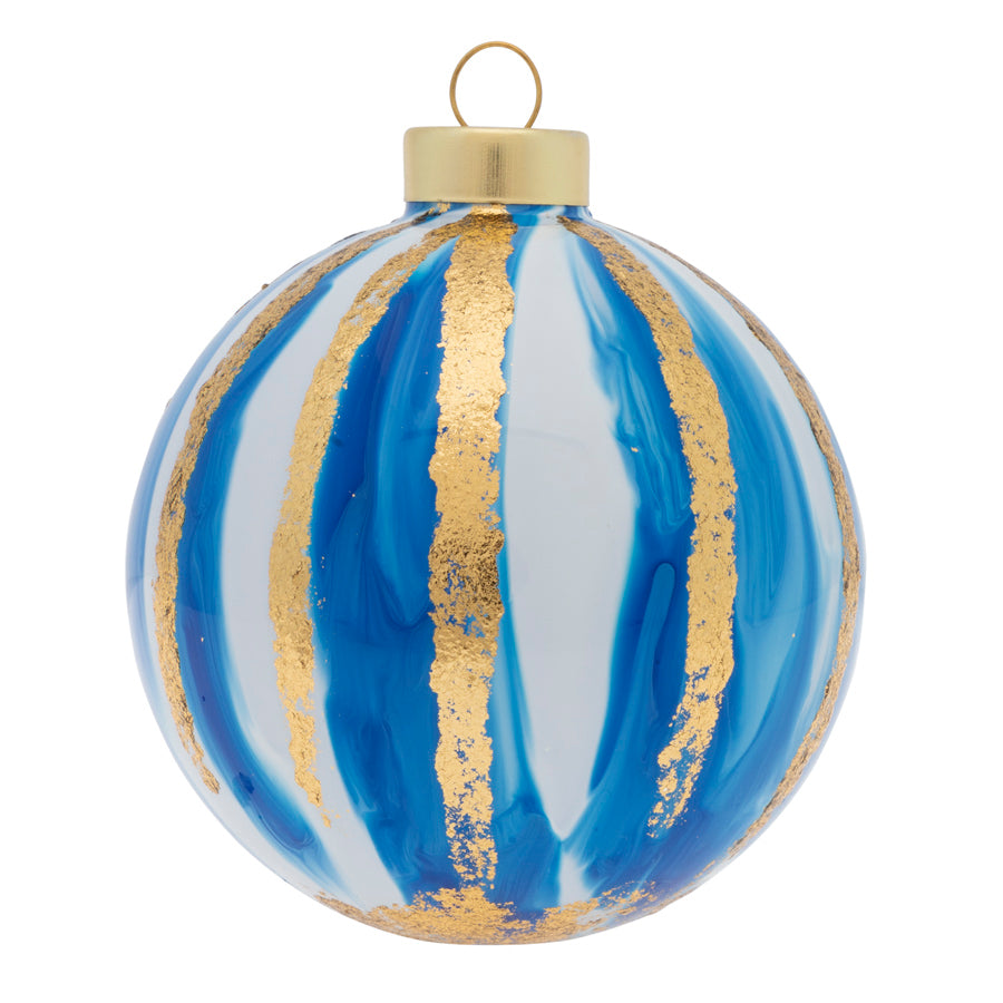 Marbled blue and white paint delicately coat this glass round, finished off with vertical gold foil stripes.