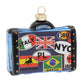 <div>Bon voyage! This luggage ornament is covered in worldly stickers from all of its extravagant travels. </div>