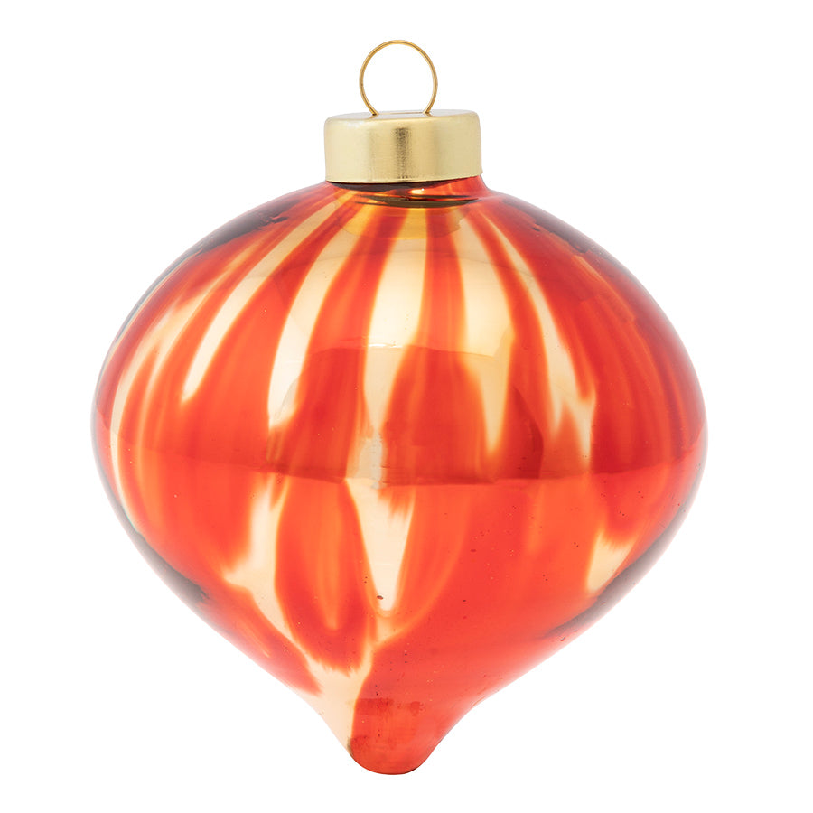 Delicately poured red paint over a classic shiny gold onion creates a truly a timeless treasure.