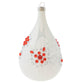 Our pearlized white teardrop glass ornament is decorated with white glittered Christmas florals and embellished with red gems.