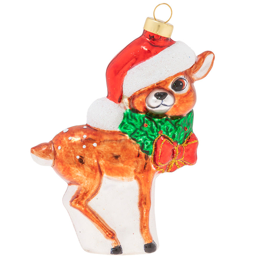 Decked out for Christmas in Santa's hat and a holly-wreath collar, this is one festive fawn!