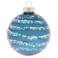 Like frost on an frozen lake, this deep blue glass round is covered in trails of shimmering icy white glitter.