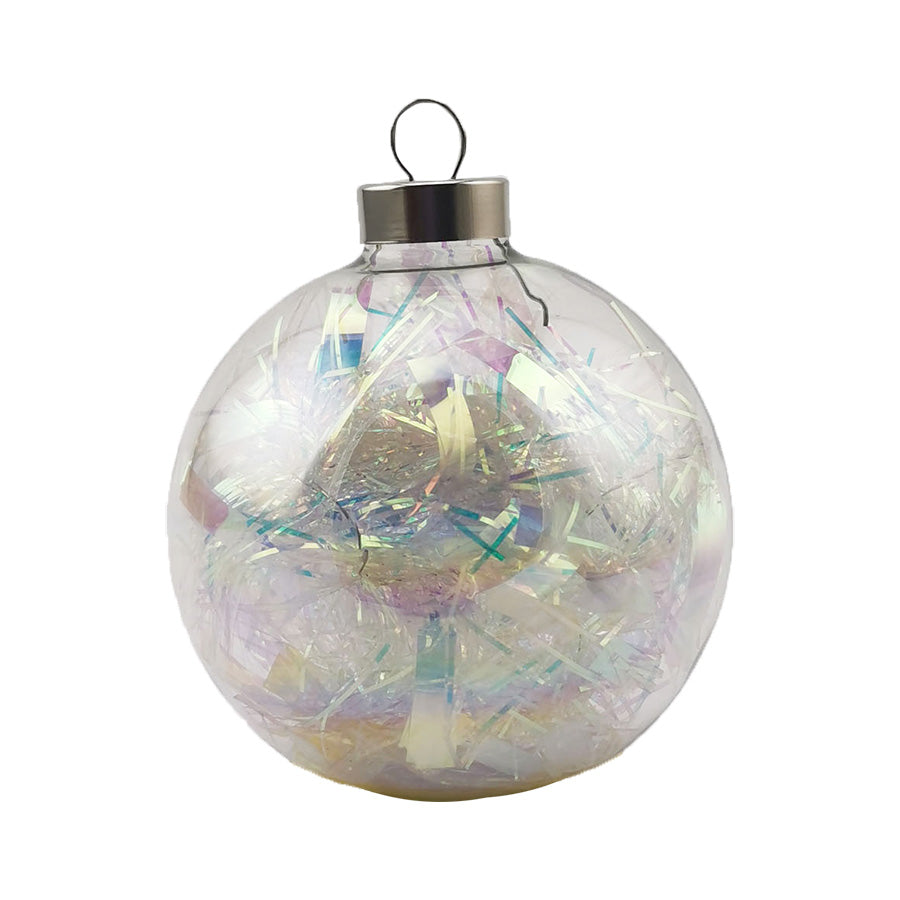 Filled with sparkling strands iridescent tinsel, this delicate glass round is sure to catch the light of every bulb on your tree! 