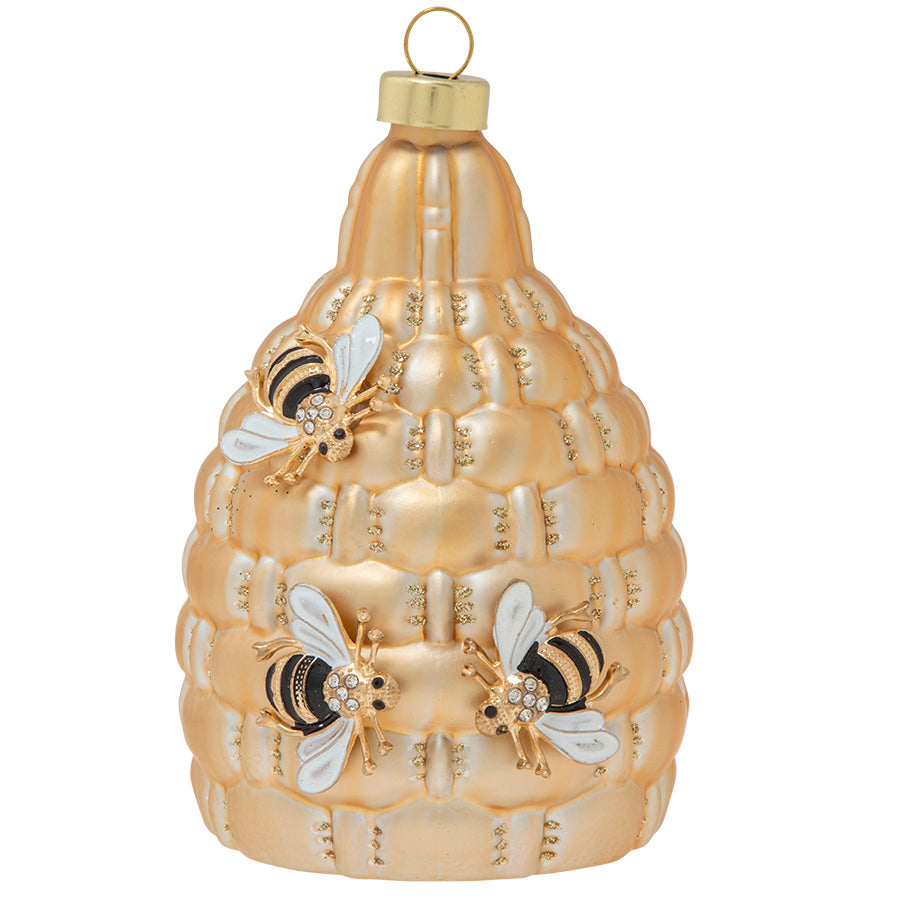 Three hardworking honey bees buzz around a matte gold hive accented by glittering gold.