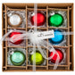 This set of nine holiday brights are a perfect pop of cheery color for any Christmas décor! 