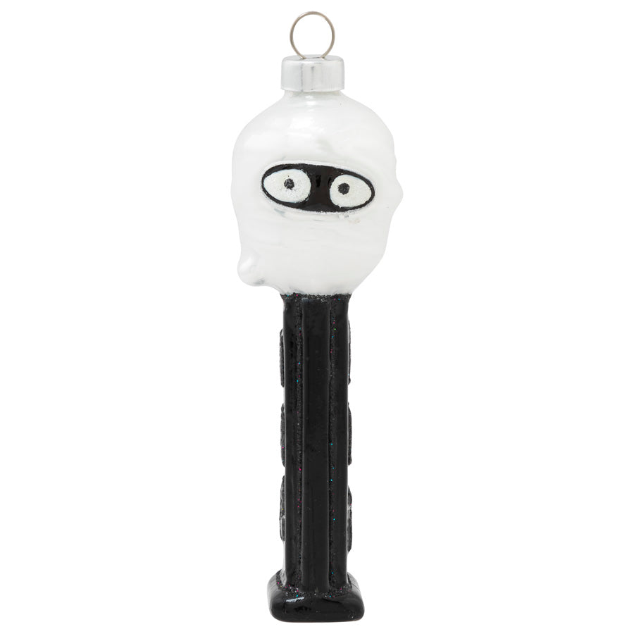 This spooky mummy head that sits atop a black officially licensed PEZ dispenser is the perfect addition to your holiday decor!  