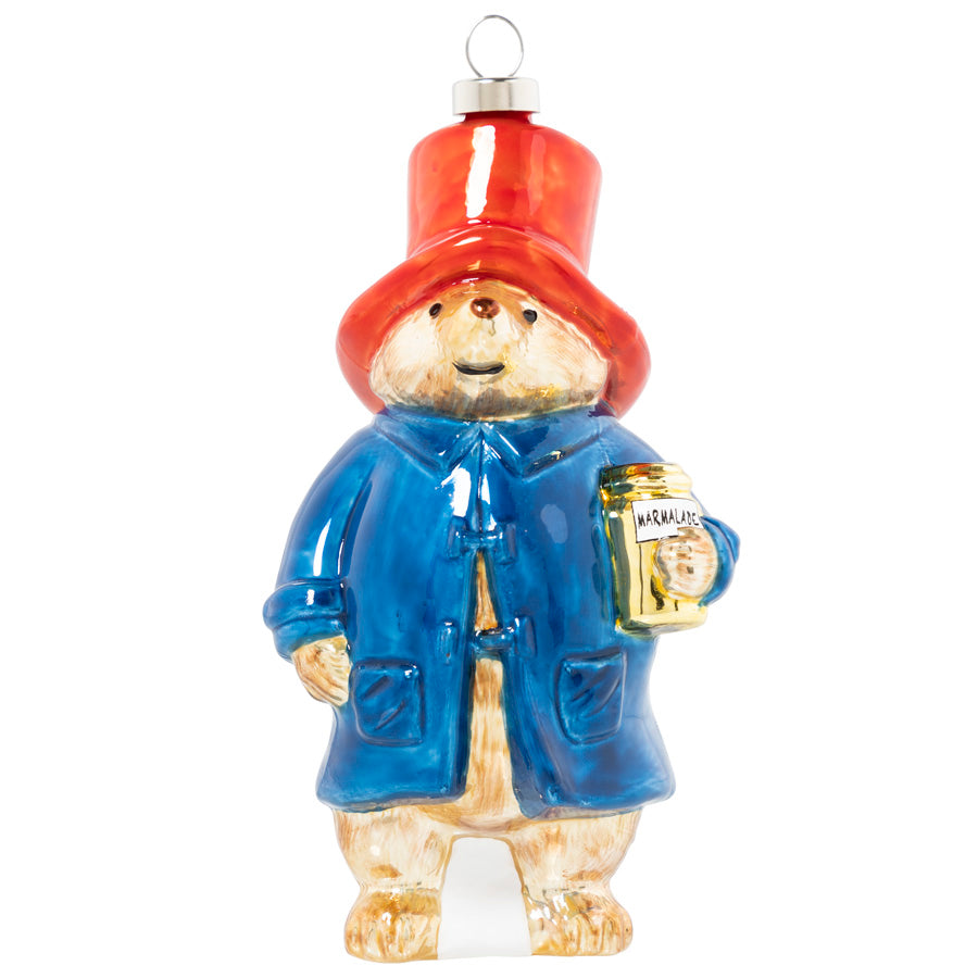 Dressed in his signature red bush hat and blue duffle coat, Paddington looks ready for his next big adventure! Hang the beloved bear from your tree and enjoy the smiles from visitors young and old. 
