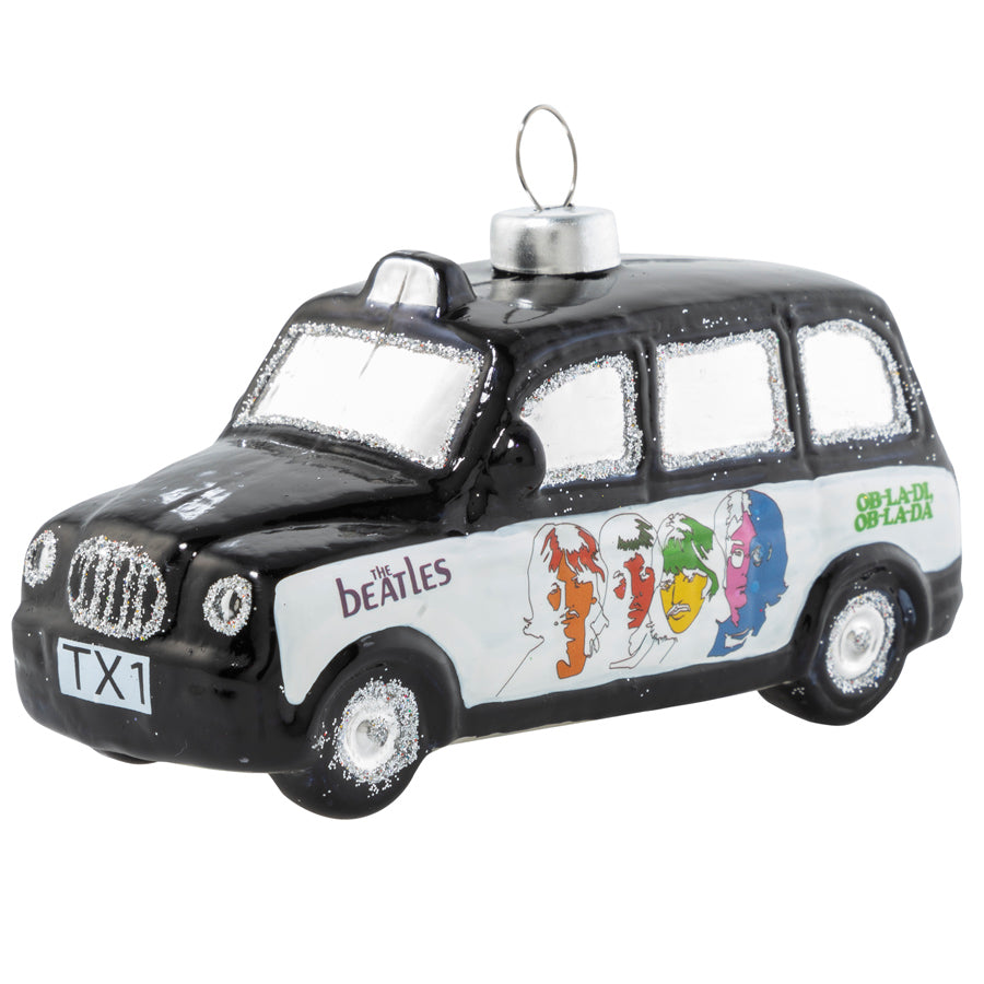 Beep beep, beep beep, yeah! Hitch a ride with the colorful faces of George, Ringo, John and Paul on this classic English taxicab ornament.