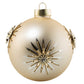 A satin champagne orb is the perfect place for an applique gold and crystal snowflake to sit atop a hand painted silver and gold glitter star burst.