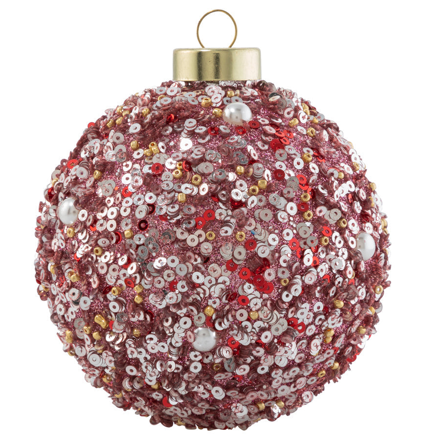 Glitter, pearls, sequins and beads in warm rosy hues bring to mind the bubbly soirées of the season!